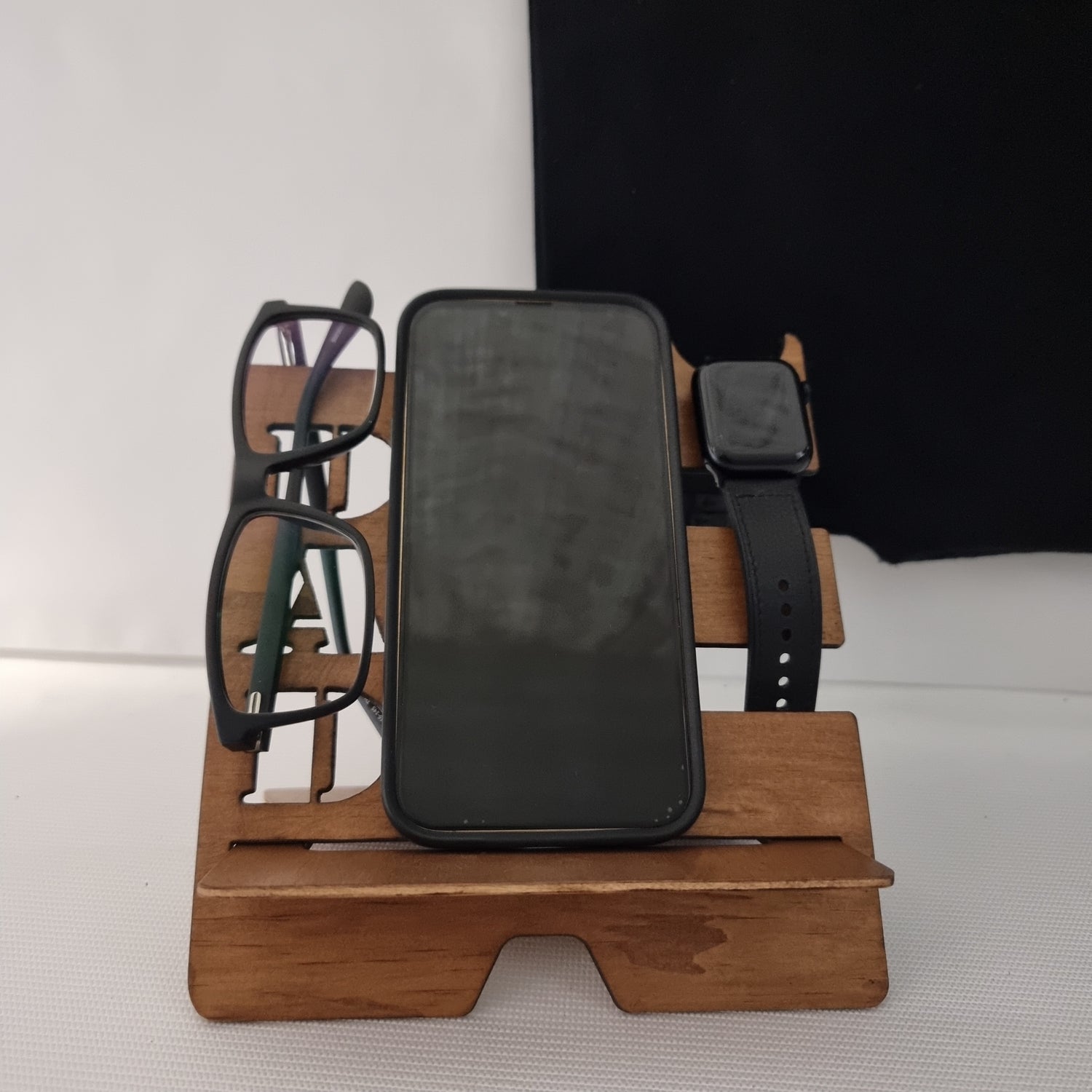 Father's Day Wooden Docking Station. With products on it